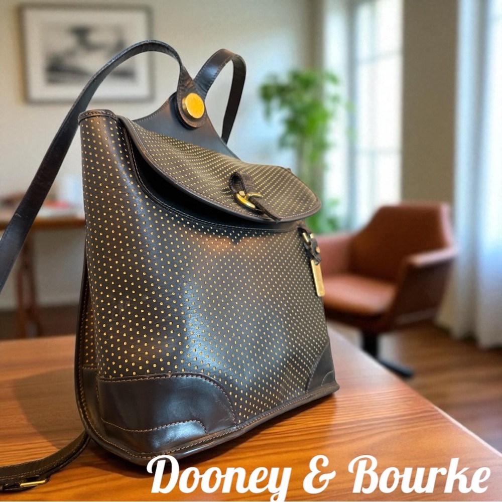 Dooney & Bourke vintage perforated leather Backpack in excellent used condition